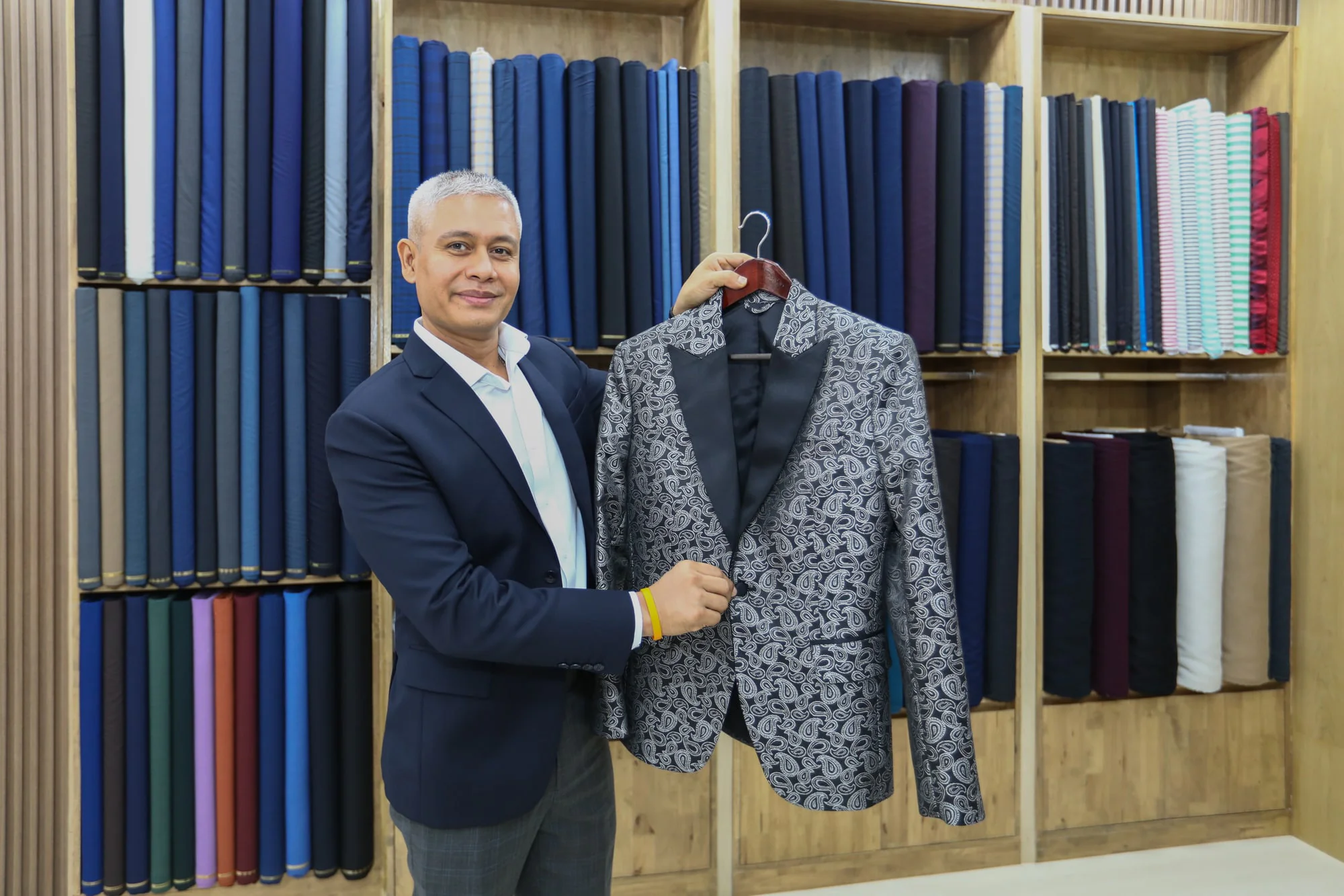 Jack presenting a patterned evening jacket with black lapels